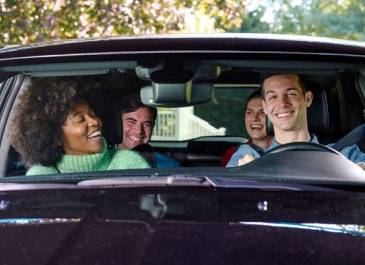 Group of people in a car that appear impaired