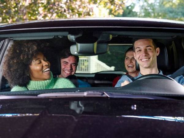 Group of people in a car that appear impaired
